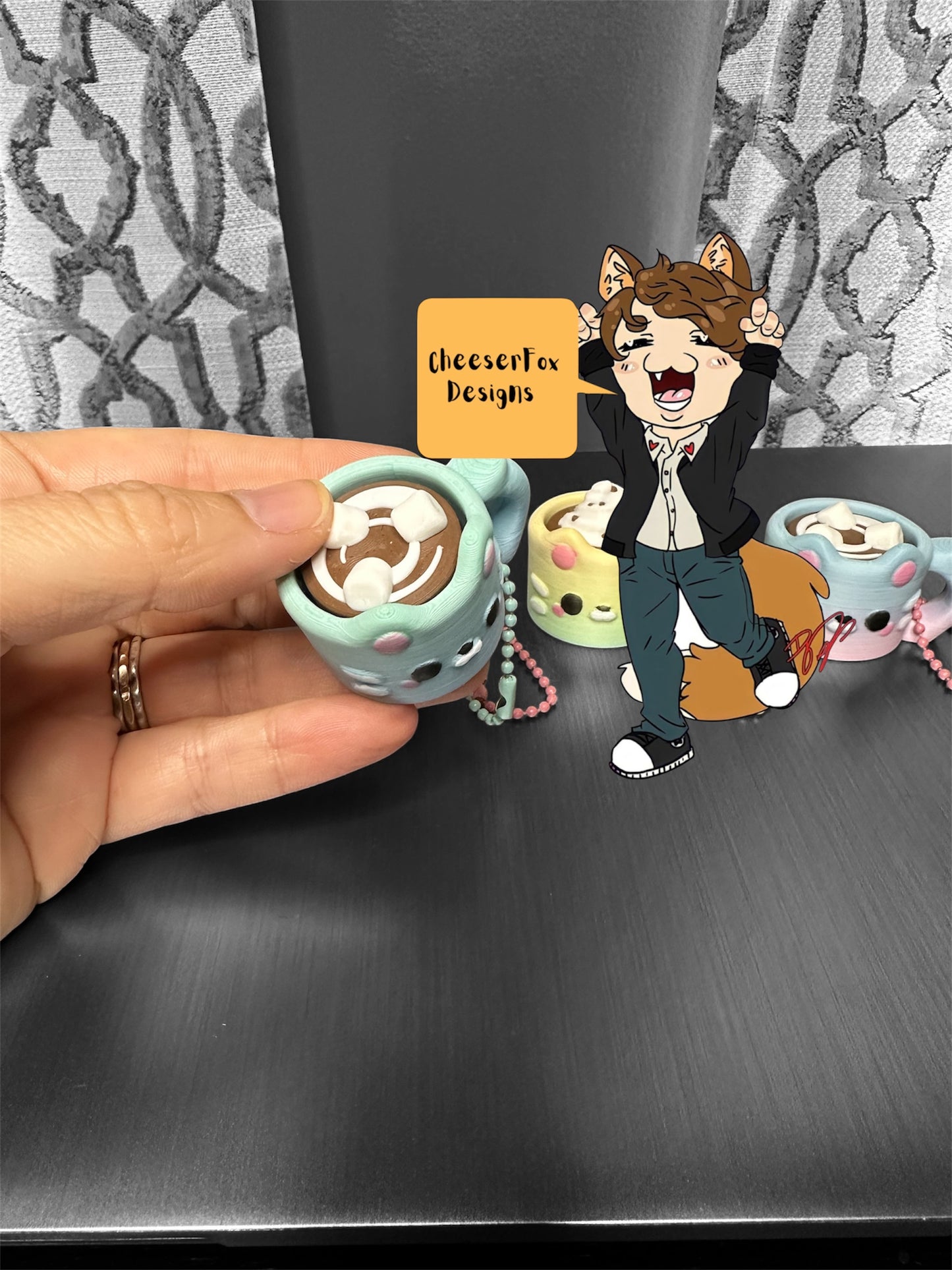 Cheeser Fox designs cat mug clickers